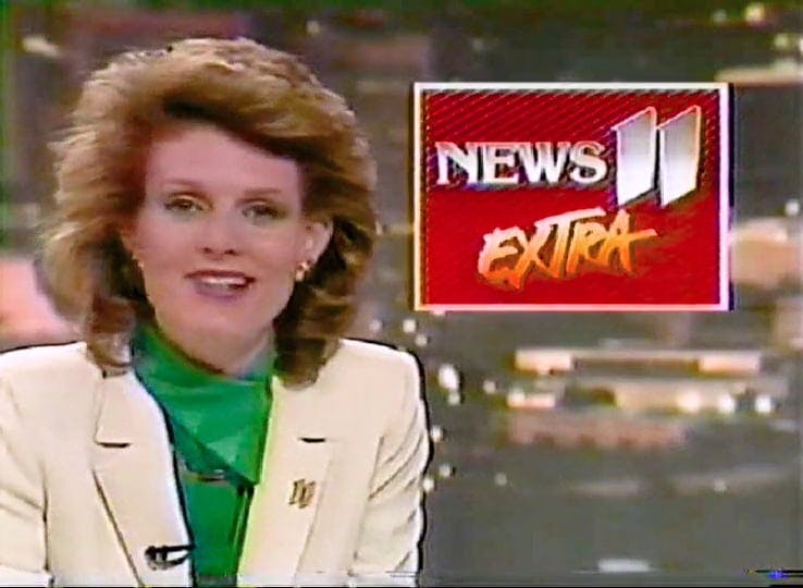 A TV News anchorwoman from 1986, a text panel to the right says "News 11 EXTRA"
