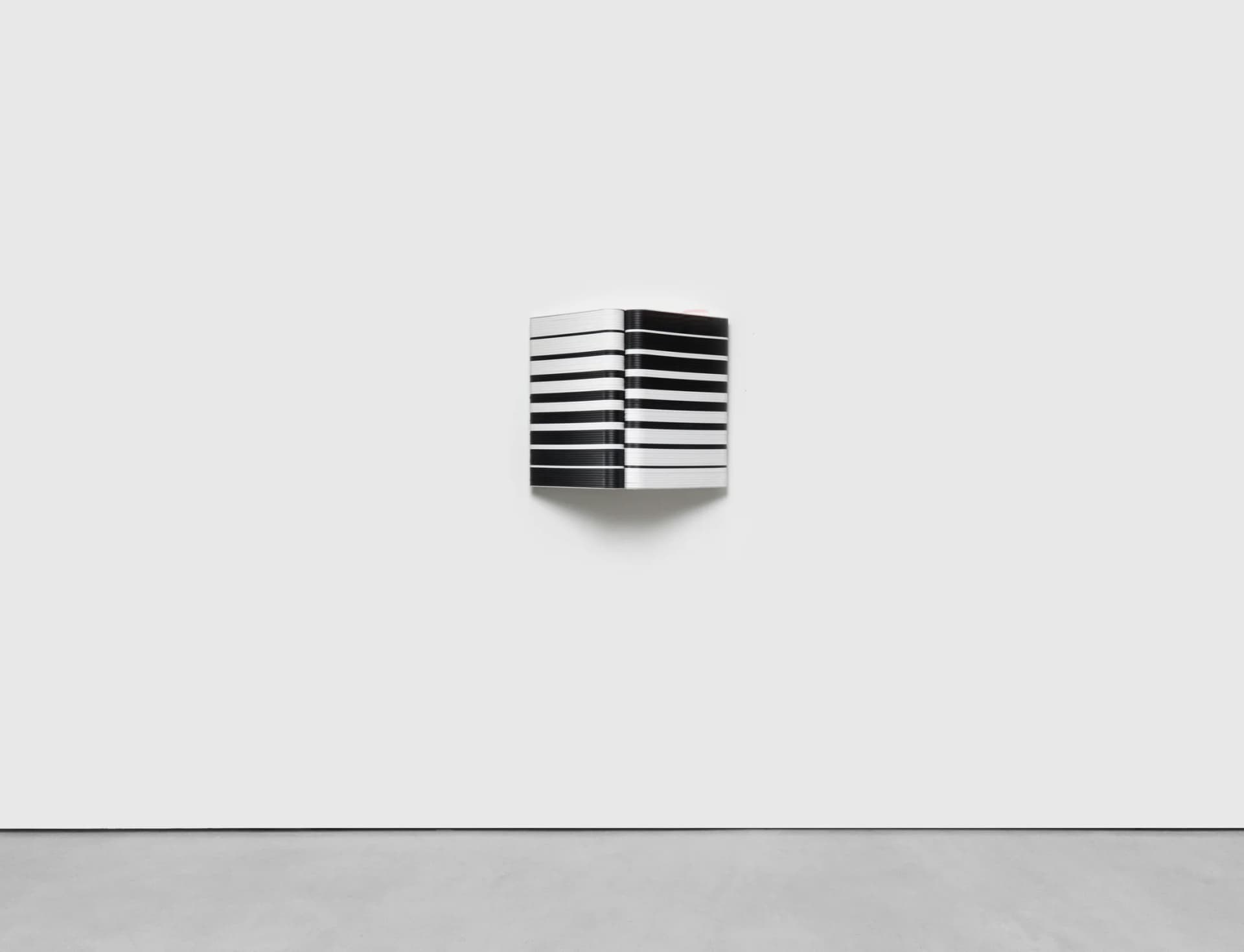 A sculptural striped wall based artwork by Jacob Dahlgren made of tessellated plastic coat hangers and aluminium.